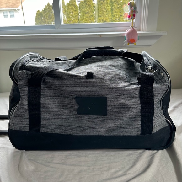 Protege Rolling Duffel Bag - Picture 2 of 6